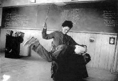 teacher paddling student